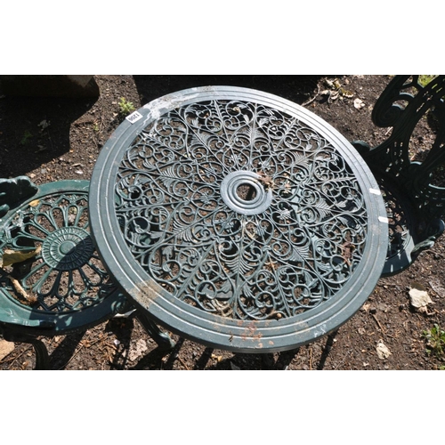 1206 - A GREEN PAINTED ALUMINIUM GARDEN TABLE, diameter 61cm x height 63cm and two chairs (3) (condition:-t... 