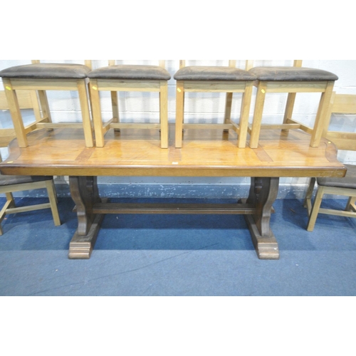 1521 - A HEAVY OAK TRESTLE DINING TABLE, with serpentine ends, length 230cm x depth 96cm x height 77cm (con... 