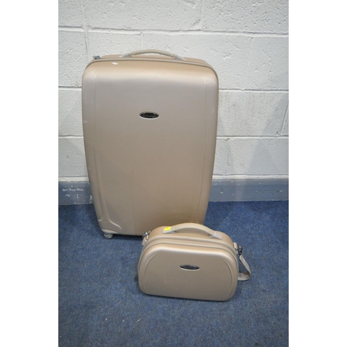 1522 - A REVOLUTION GOLD HARD SHELL SUITCASE, and a matching hand luggage bag (2)