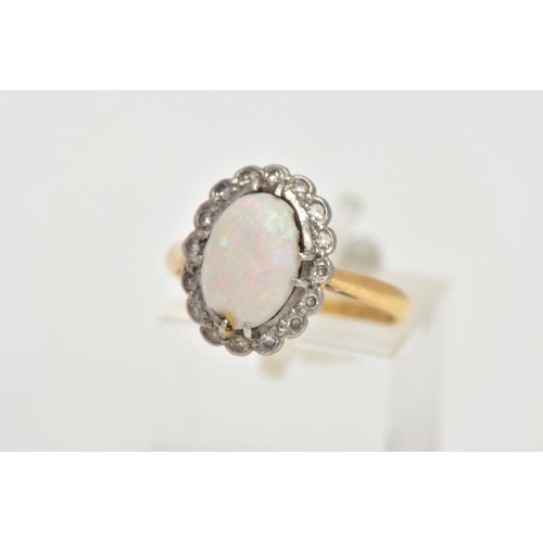 11 - A 9CT GOLD OPAL AND DIAMOND CLUSTER RING, of an oval form, centring on an oval cut opal cabochon, sh... 