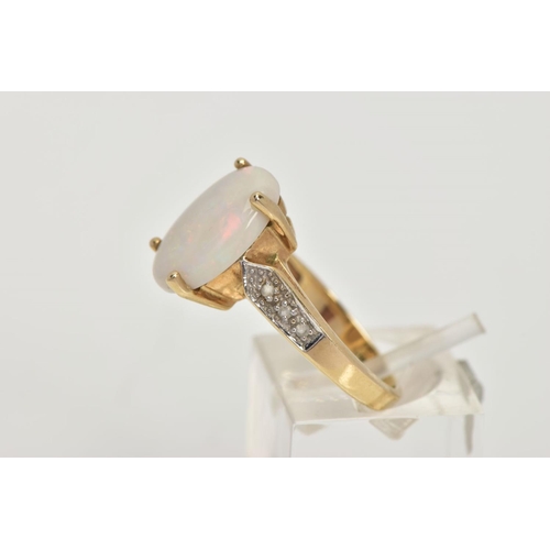 25 - A 9CT GOLD OPAL AND DIAMOND DRESS RING, four claw set white opal cabochon showing flashes of blue, g... 