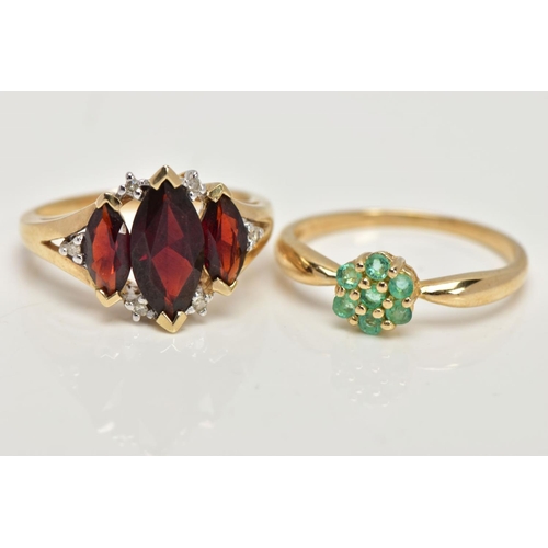 27 - TWO 9CT GOLD GEM SET RINGS, the first designed with three graduating marquise cut garnets, single cu... 