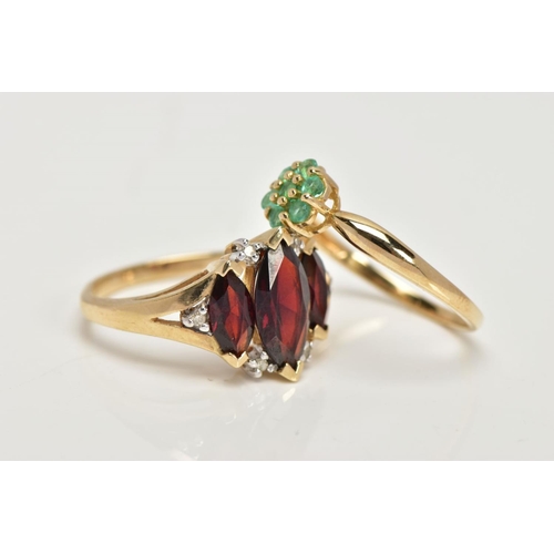 27 - TWO 9CT GOLD GEM SET RINGS, the first designed with three graduating marquise cut garnets, single cu... 