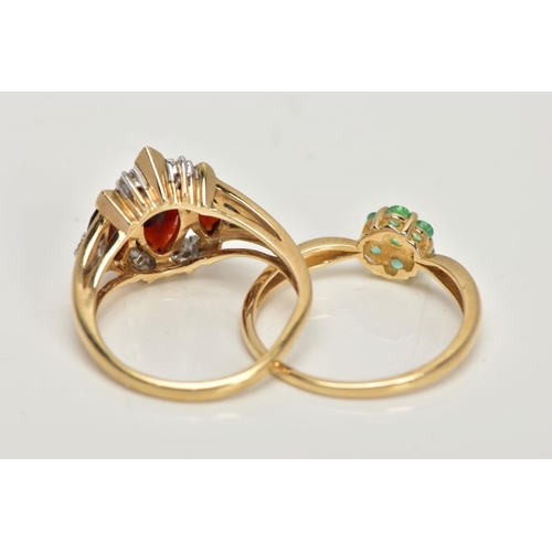 27 - TWO 9CT GOLD GEM SET RINGS, the first designed with three graduating marquise cut garnets, single cu... 