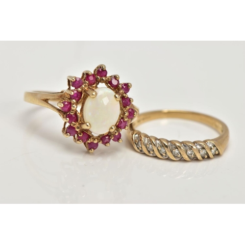 31 - TWO 9CT GOLD GEM SET DRESS RINGS, the first a yellow gold cluster ring, centring on a four claw set,... 