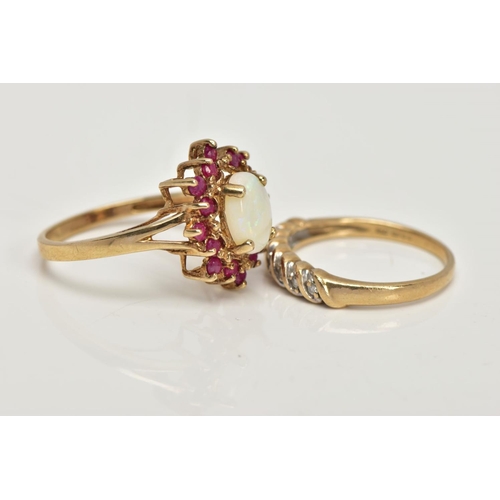 31 - TWO 9CT GOLD GEM SET DRESS RINGS, the first a yellow gold cluster ring, centring on a four claw set,... 