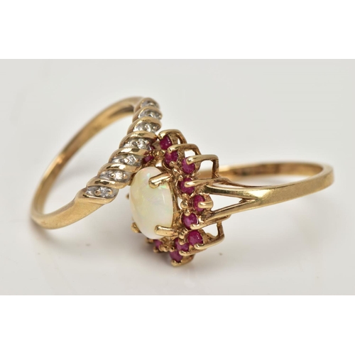 31 - TWO 9CT GOLD GEM SET DRESS RINGS, the first a yellow gold cluster ring, centring on a four claw set,... 