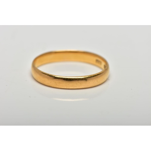 42 - A 22CT GOLD BAND RING, a yellow gold courted band ring, approximate width 3.5mm, hallmarked 22ct Bir... 