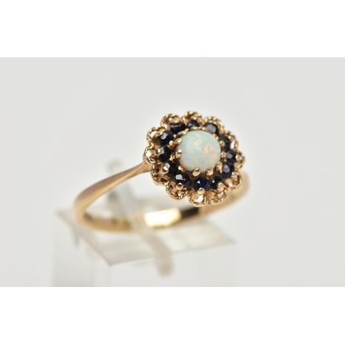 50 - A 9CT YELLOW GOLD SAPPHIRE AND OPAL CLUSTER RING, set with a principal opal cabochon, surrounded by ... 