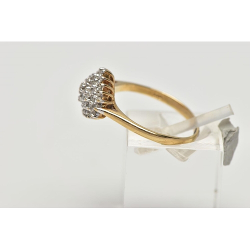 57 - A 9CT YELLOW GOLD DIAMOND DRESS RING, the tiered cluster set throughout with approximately forty-thr... 