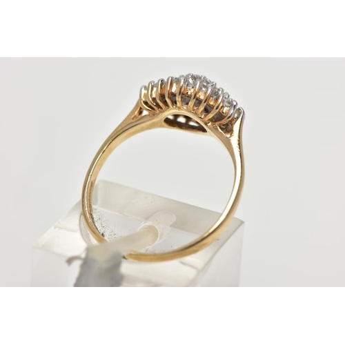 57 - A 9CT YELLOW GOLD DIAMOND DRESS RING, the tiered cluster set throughout with approximately forty-thr... 