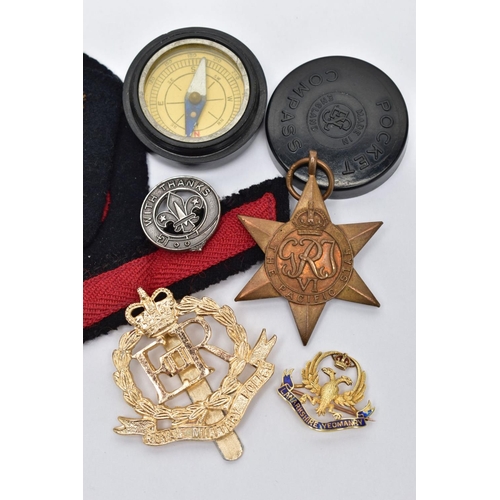 74 - A SELECTION OF SILVER AND YELLOW METAL MAINLY MILITARY ITEMS, to include a yellow metal doubled head... 