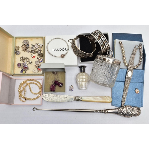 81 - AN ASSORTMENT OF MAINLY SILVER AND COSTUME JEWELLERY, to include an early 20th century molded glass ... 