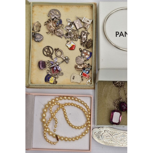 81 - AN ASSORTMENT OF MAINLY SILVER AND COSTUME JEWELLERY, to include an early 20th century molded glass ... 