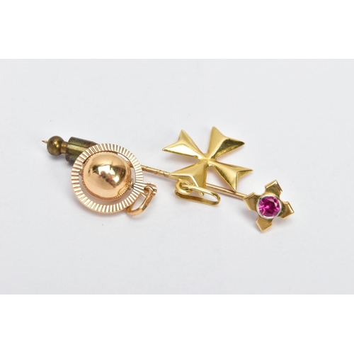 9 - TWO YELLOW METAL CHARMS AND A STICK PIN, to include a puffy Maltese cross charm fitted with an oval ... 