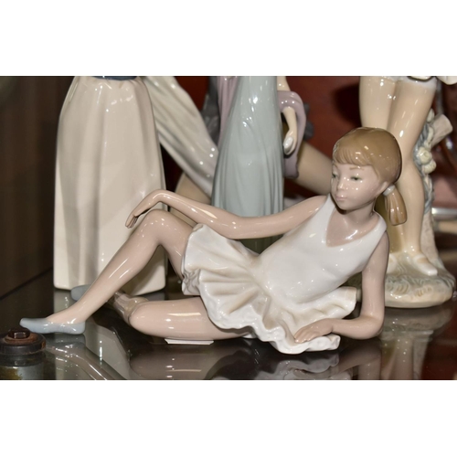 417 - A LLADRO FIGURE OF A LADY, THREE NAO FIGURES ANOTHER SPANISH PORCELAIN FIGURE, the Lladro 'Ingenue',... 