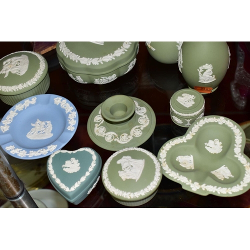 430 - THIRTEEN PIECES OF WEDGWOOD JASPERWARE, mostly in green, including a pale blue limited edition lovin... 