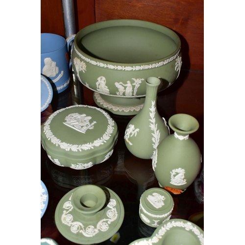 430 - THIRTEEN PIECES OF WEDGWOOD JASPERWARE, mostly in green, including a pale blue limited edition lovin... 