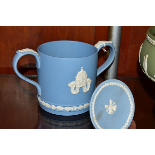 430 - THIRTEEN PIECES OF WEDGWOOD JASPERWARE, mostly in green, including a pale blue limited edition lovin... 