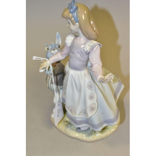 446 - A LLADRO FIGURE, Alice in Wonderland No5740, designed by Jose Luis Alvarez 1991, retired 1998, heigh... 