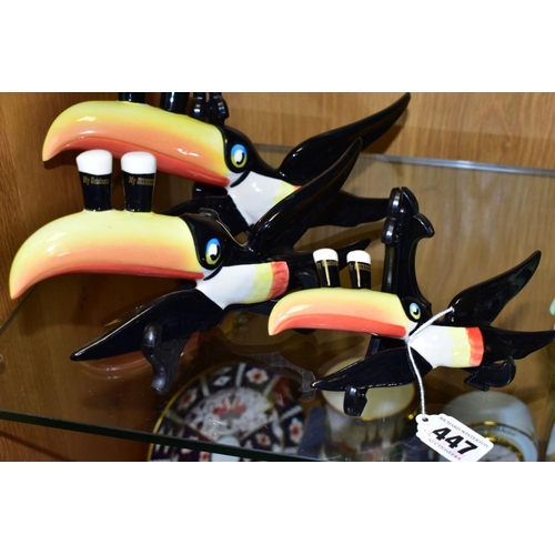 447 - A SET OF THREE REPRODUCTION GUINNESS FLYING TOUCANS, modern reproductions in graduating sizes, lengt... 