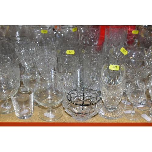 521 - A COLLECTION OF CRYSTAL AND OTHER GLASSWARE, including a pair of decanters with original stoppers (s... 