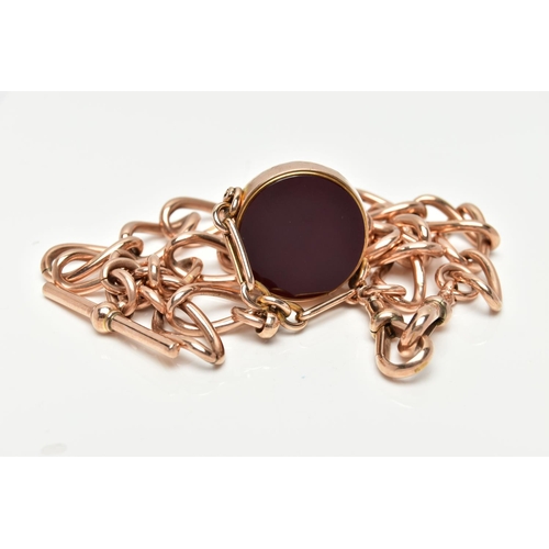 10 - AN EARLY 20TH CENTURY 9CT GOLD ALBERT CHAIN AND HARDSTONE SWIVEL FOB, rose gold Albert chain designe... 