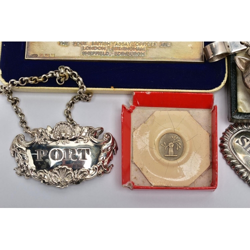 103 - A PARCEL OF SILVER DECANTER LABELS, MEDALLIONS, CADDY SPOON, ETC, comprising a William IV 'SHERRY' d... 