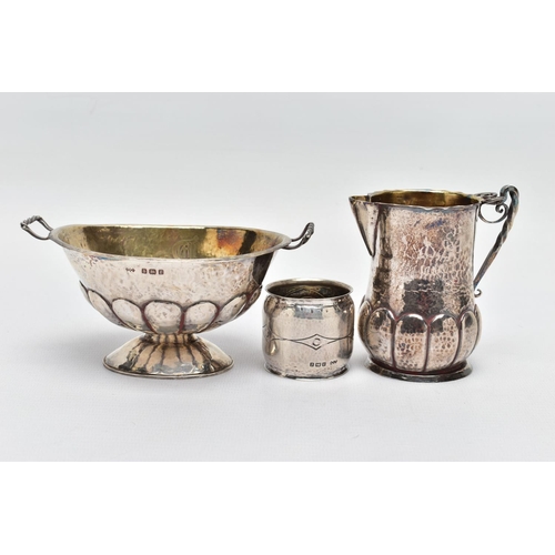 106 - AN ARTS AND CRAFTS SILVER CREAM JUG AND SUGAR BOWL BY JOHN WILLIAM BARRETT, both with planished fini... 