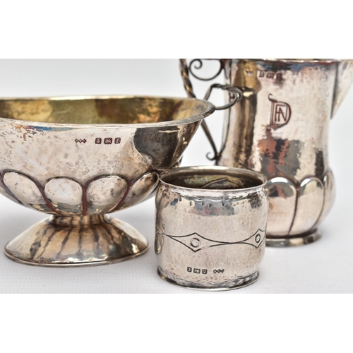 106 - AN ARTS AND CRAFTS SILVER CREAM JUG AND SUGAR BOWL BY JOHN WILLIAM BARRETT, both with planished fini... 