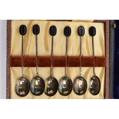 109 - THREE CASES OF SILVER TEA AND COFFEE SPOONS AND A CASED GEORGE VI SILVER FIVE PIECE CRUET SET, compr... 