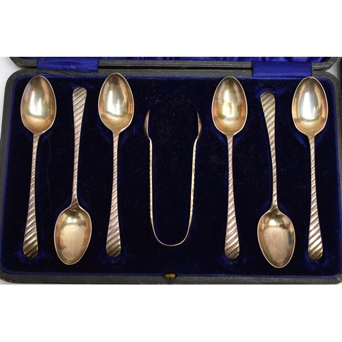 109 - THREE CASES OF SILVER TEA AND COFFEE SPOONS AND A CASED GEORGE VI SILVER FIVE PIECE CRUET SET, compr... 