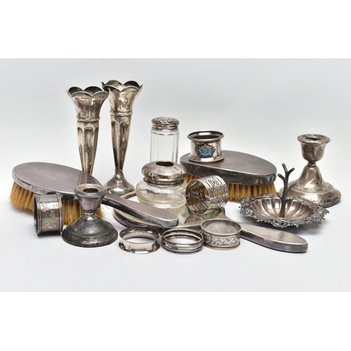 110 - A PARCEL OF 20TH CENTURY SILVER, including five assorted circular napkin rings, one with enamelled M... 