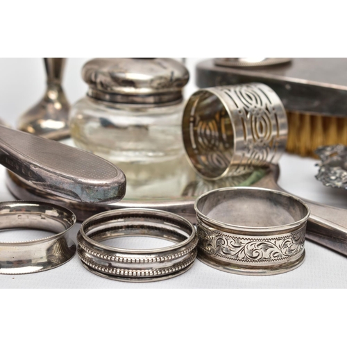 110 - A PARCEL OF 20TH CENTURY SILVER, including five assorted circular napkin rings, one with enamelled M... 