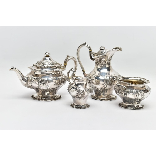 117 - AN EDWARDIAN SCOTTISH SILVER FOUR PIECE BACHELOR'S TEA SERVICE OF CIRCULAR, comprising tea pot, hot ... 