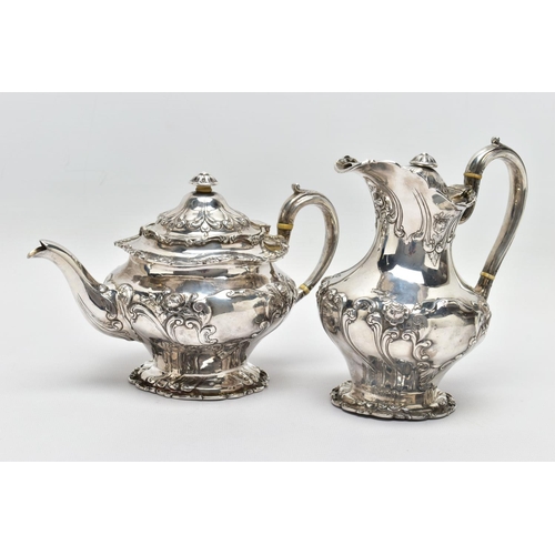 117 - AN EDWARDIAN SCOTTISH SILVER FOUR PIECE BACHELOR'S TEA SERVICE OF CIRCULAR, comprising tea pot, hot ... 