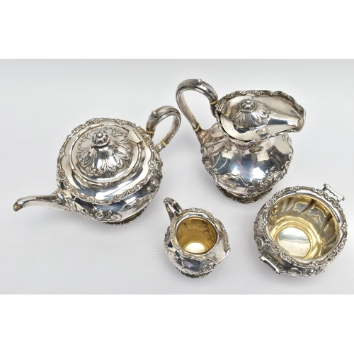 117 - AN EDWARDIAN SCOTTISH SILVER FOUR PIECE BACHELOR'S TEA SERVICE OF CIRCULAR, comprising tea pot, hot ... 