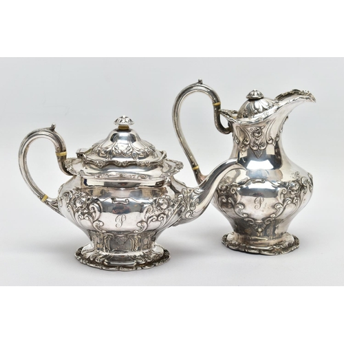 117 - AN EDWARDIAN SCOTTISH SILVER FOUR PIECE BACHELOR'S TEA SERVICE OF CIRCULAR, comprising tea pot, hot ... 