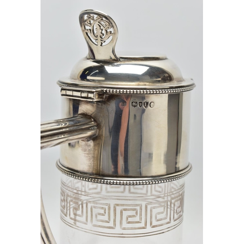 119 - A LATE VICTORIAN SILVER MOUNTED GLASS CLARET JUG, the hinged cover with foliate pierced thumbpiece, ... 