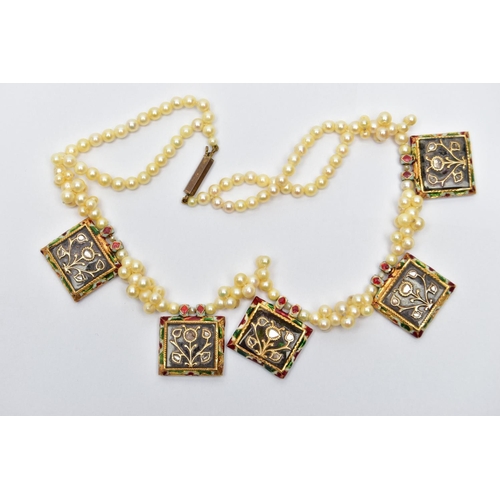 12 - AN INDIAN YELLOW METAL DIAMOND AND ENAMEL CULTURED PEARL NECKLACE, the front designed as a series of... 