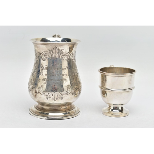 124 - A VICTORIAN SILVER BALUSTER TANKARD, S scroll handle with leaf shaped thumb rest, foliate engraved b... 