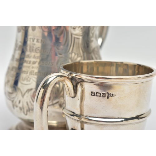 124 - A VICTORIAN SILVER BALUSTER TANKARD, S scroll handle with leaf shaped thumb rest, foliate engraved b... 