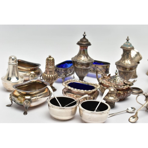 130 - AN ASSORTMENT OF EARLY 20TH CENTURY SILVER CONDIMENTS SETS AND NAPKIN RINGS, to include two matching... 