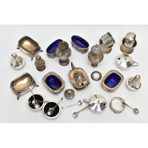 130 - AN ASSORTMENT OF EARLY 20TH CENTURY SILVER CONDIMENTS SETS AND NAPKIN RINGS, to include two matching... 