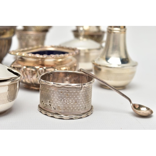 130 - AN ASSORTMENT OF EARLY 20TH CENTURY SILVER CONDIMENTS SETS AND NAPKIN RINGS, to include two matching... 