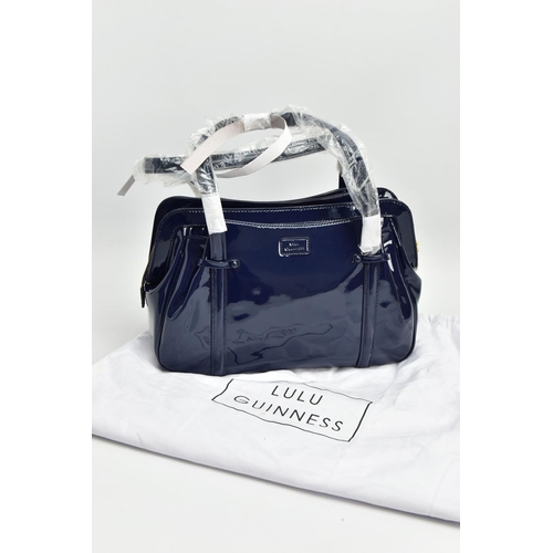 133 - AN UNUSED LULU GUINNESS 'FRANKA' PATENT LEATHER MIDNIGHT BLUE HANDBAG, striped black and stone fabri... 