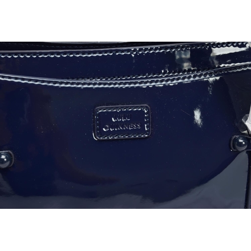 133 - AN UNUSED LULU GUINNESS 'FRANKA' PATENT LEATHER MIDNIGHT BLUE HANDBAG, striped black and stone fabri... 