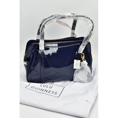 133 - AN UNUSED LULU GUINNESS 'FRANKA' PATENT LEATHER MIDNIGHT BLUE HANDBAG, striped black and stone fabri... 