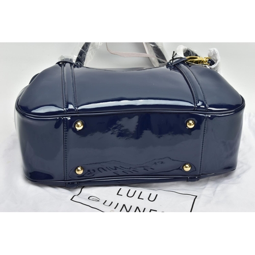 133 - AN UNUSED LULU GUINNESS 'FRANKA' PATENT LEATHER MIDNIGHT BLUE HANDBAG, striped black and stone fabri... 