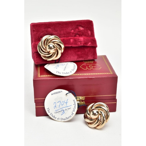 136 - DUKE & DUCHESS OF WINDSOR INTEREST, a pair of Bergere gold plated clip on earrings of open swirl des... 